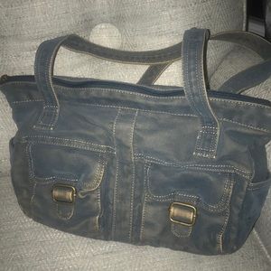 Fossil distressed denim bag.